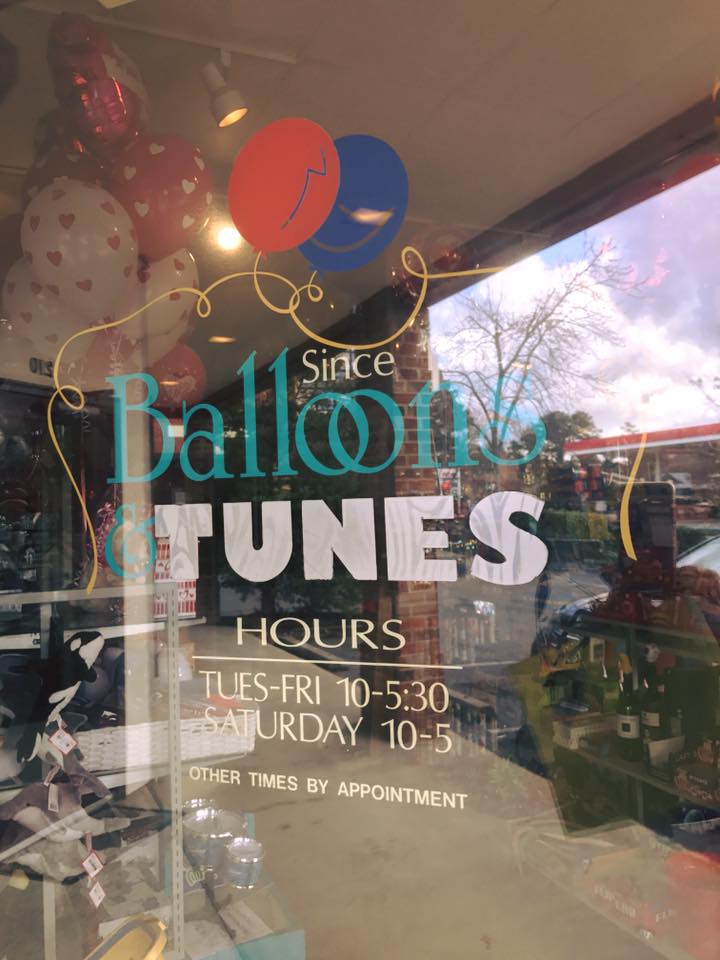 Balloons and Tunes store front window